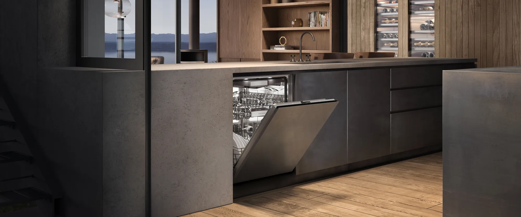 Cuisine moderne avec lave-vaisselle ouvert en acier inoxydable intégré dans des meubles foncés sous un plan de travail clair.